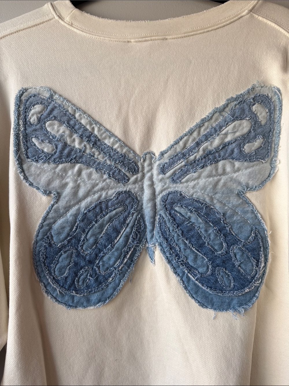 Tricia Fix Free People cream Sweatshirt with Denim Blue Butterfly Applique M - Picture 2 of 7